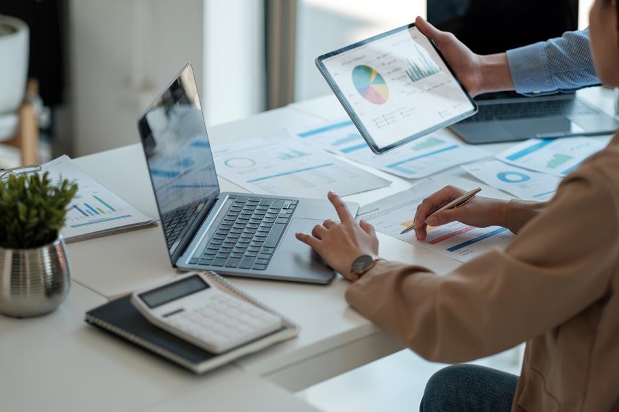Business people are meeting for analysis data figures to plan business strategies. Business discussing concept,